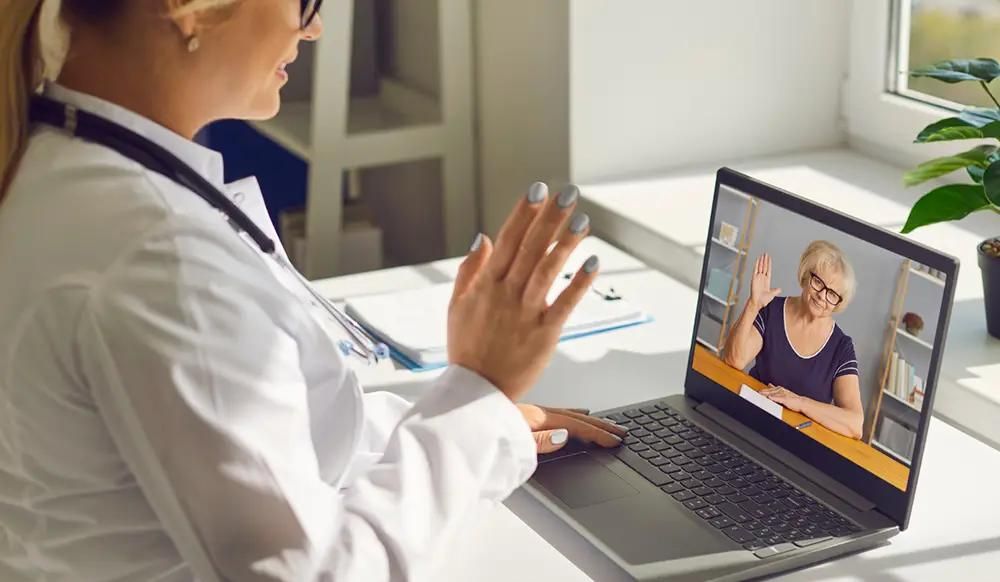 Woman talking to a doctor on a Telehealth call