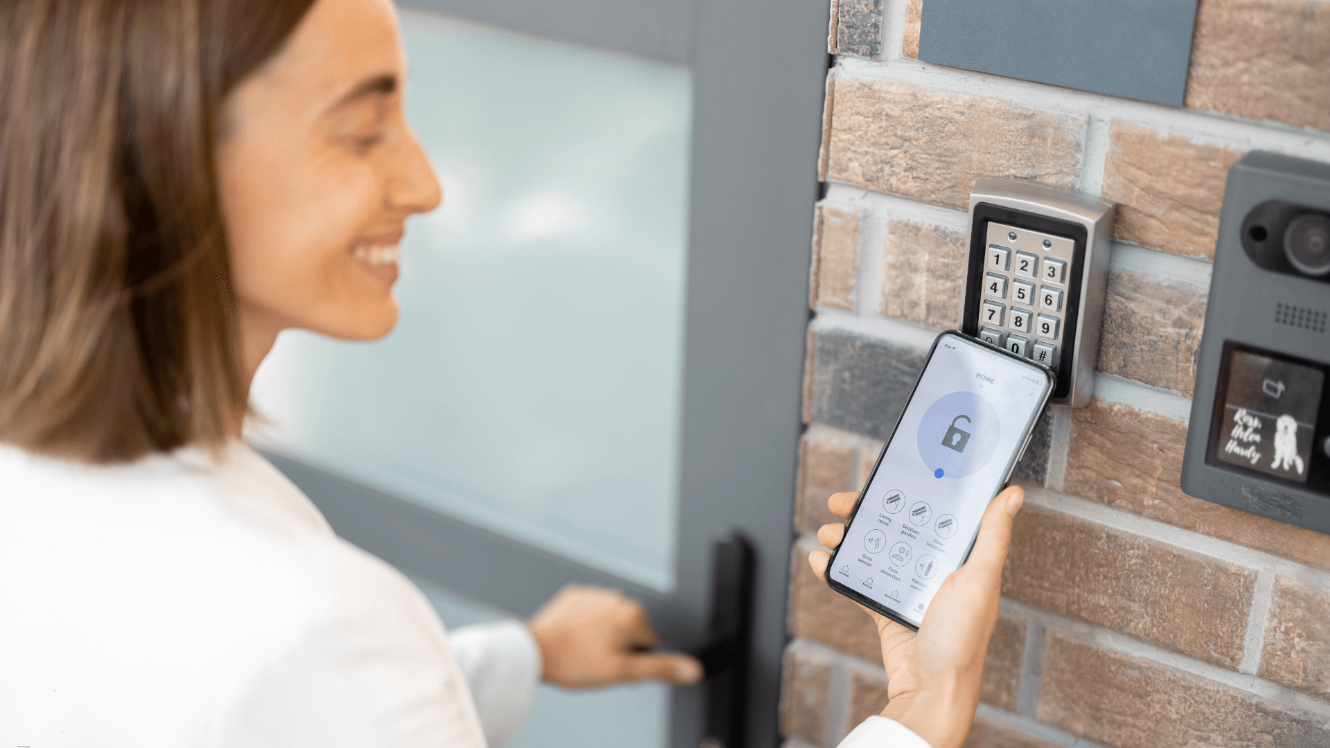 Woman using a smart lock to get inside a house 