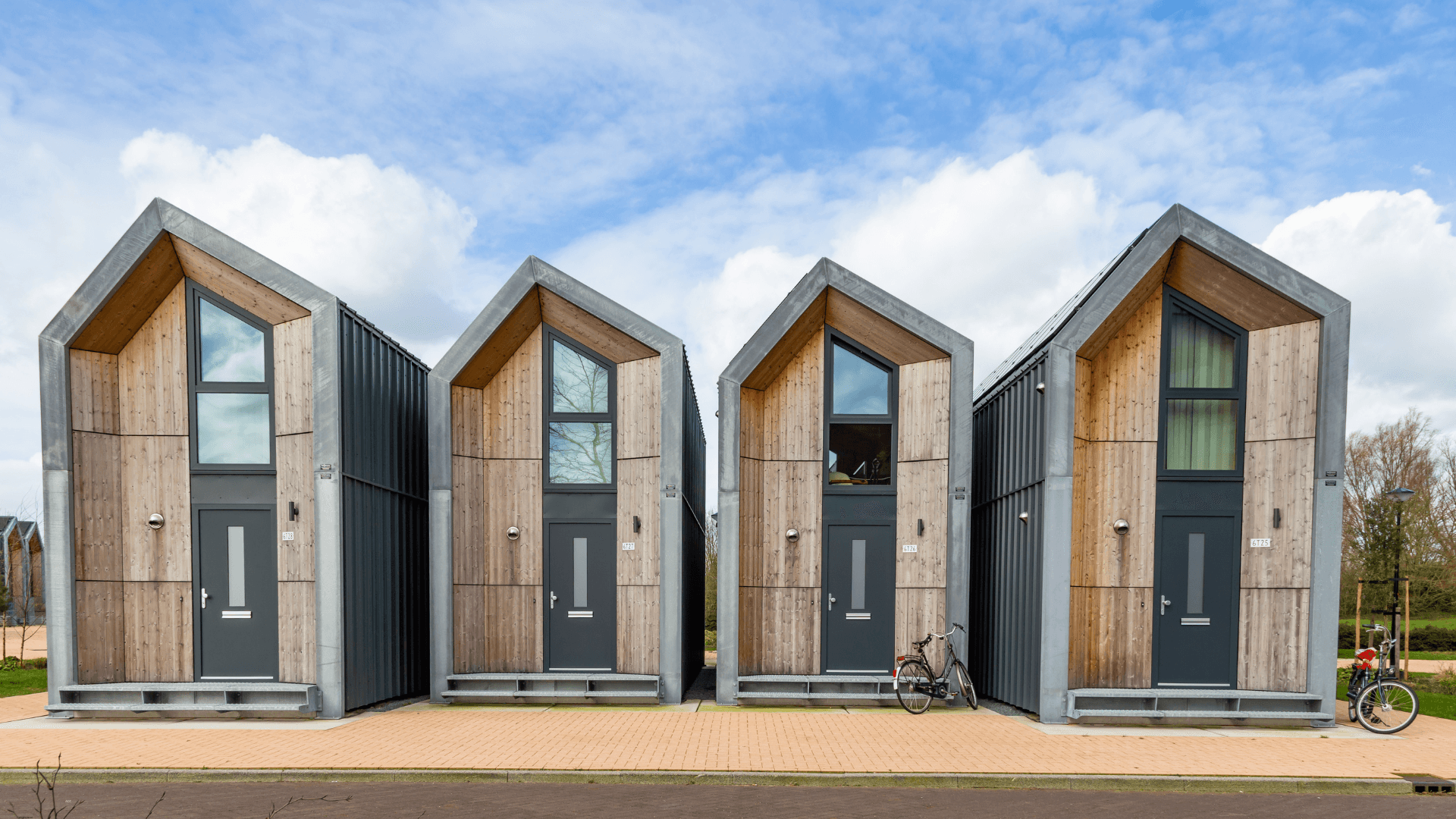 Row of 4 different two story tiny homes